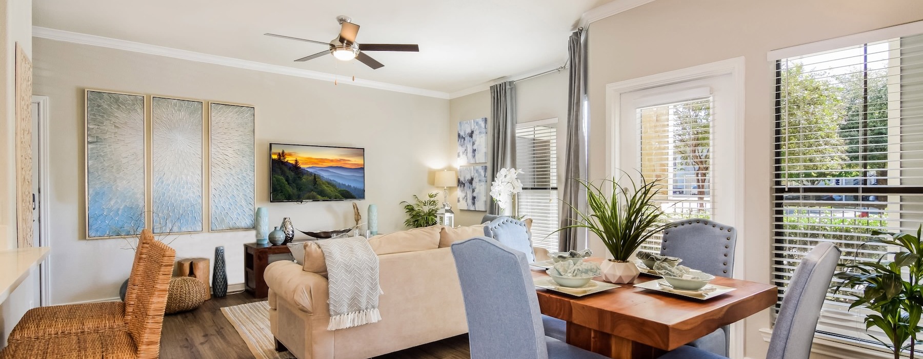 living room with tv couch and dining room table
