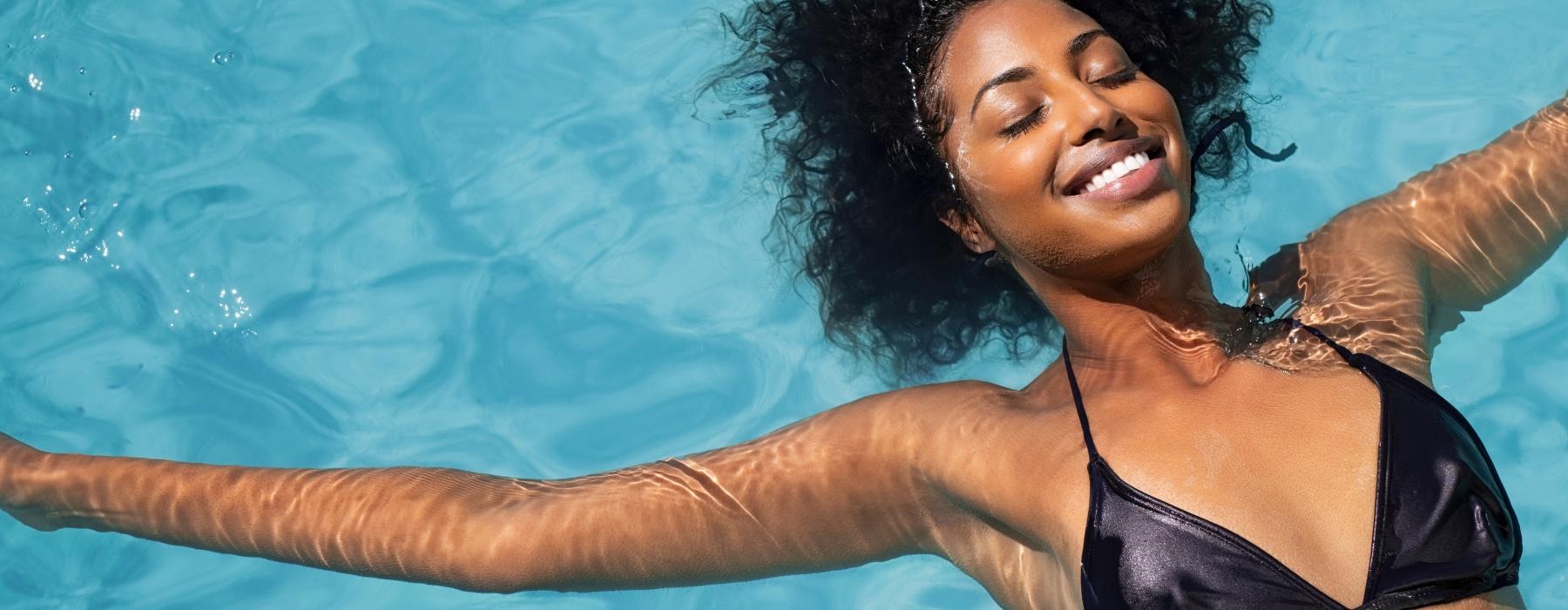 a woman in a swimsuit in the water