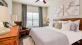 a bedroom with a large bed